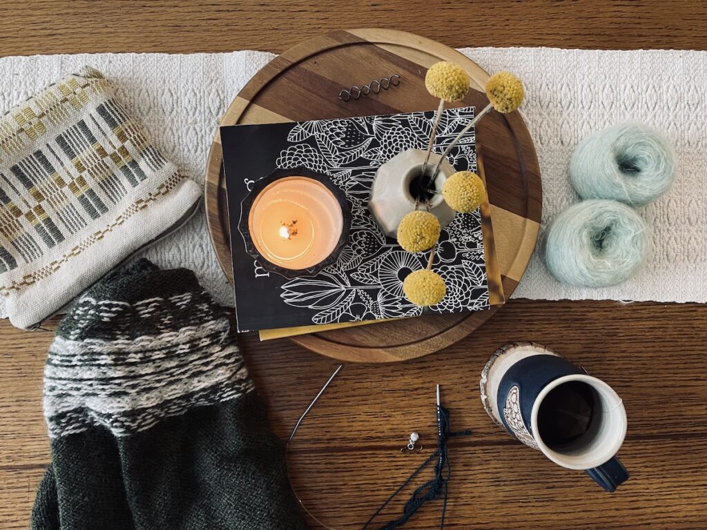 Weaving in ends and casting on with magazine and tea. 